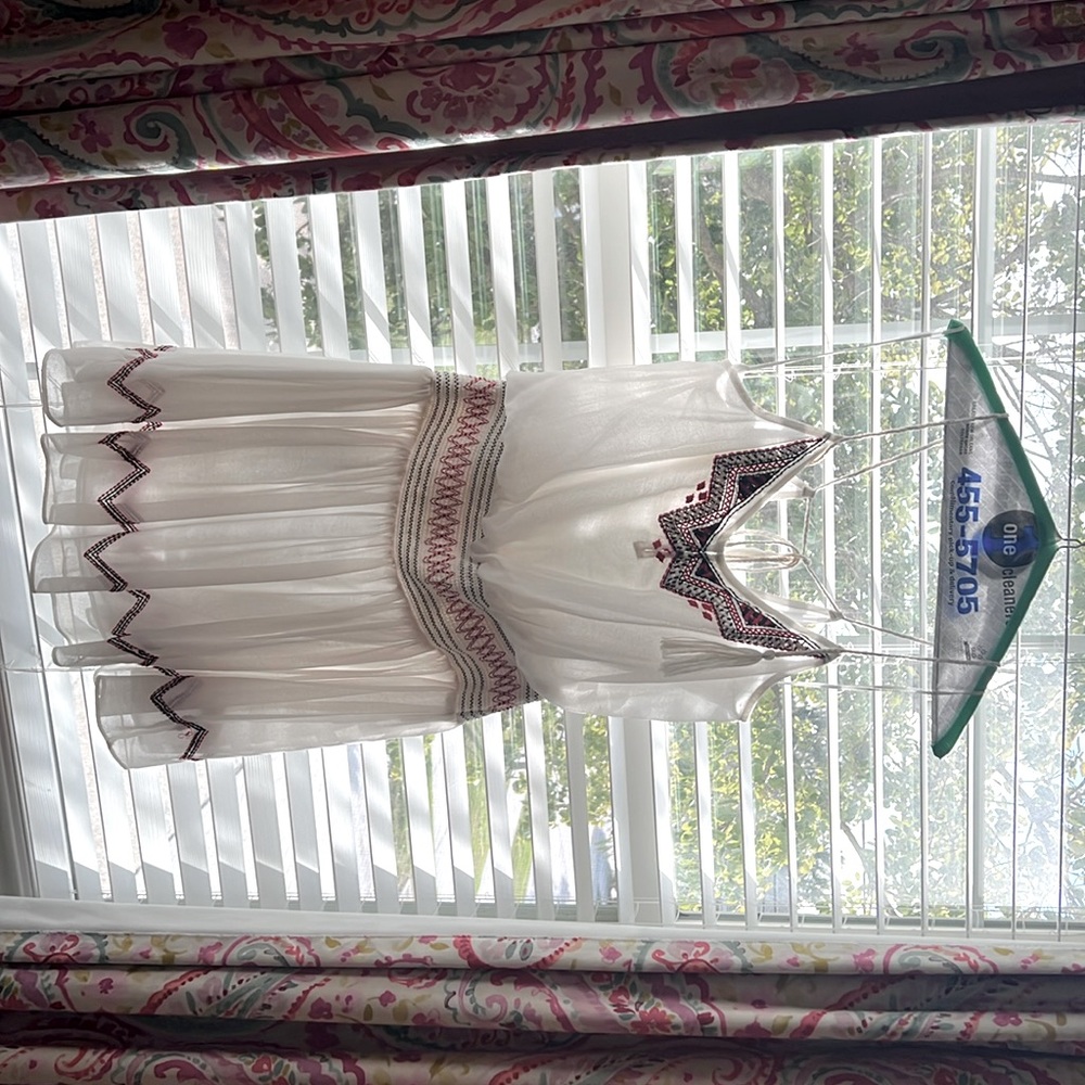 Free People large white gauze dress with tassel and beading detail Dry cleaned.